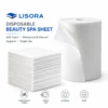 LISORA white disposable nonwoven towels displayed as stacked flat sheets and a pearl-embossed roll, with blue and gray promotional text and feature icons.