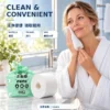 Woman using disposable facial tissue in bathroom